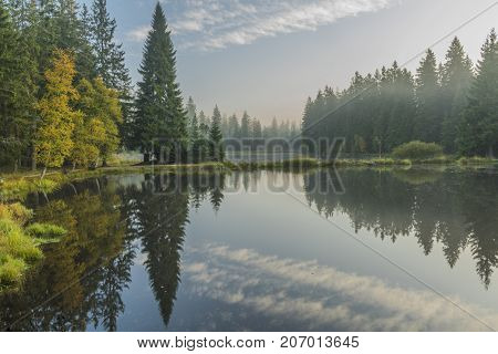 Morning fog near Bahnak ponds in autumn Kladska village