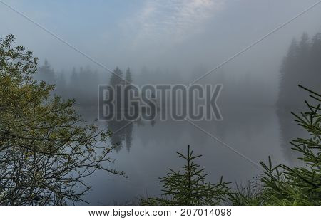 Morning fog near Bahnak ponds in autumn Kladska village