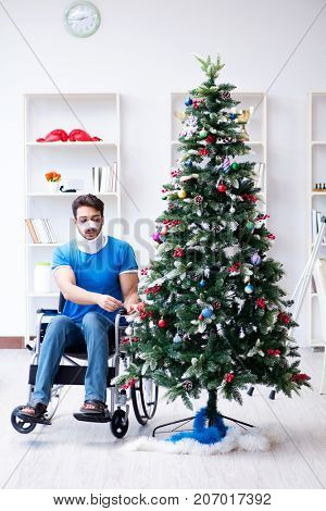 Injured disabled man celebrating christmas at home