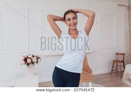 Woman with a big breast in a white T-shirt. Mock-up.