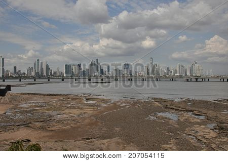 Panama city with high skyscrapers and port on the Pacific coast