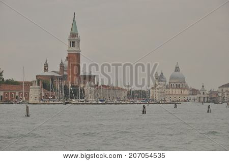 Narrow canals and alleyways in Venice. City of monuments in gondola.