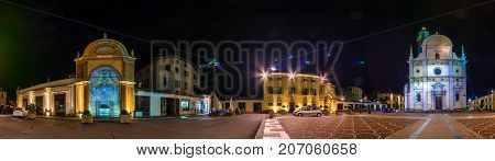Night panorama square with Church of Madonna di Tirano, Tirano, Lombardy, Italy on July 11, 2017