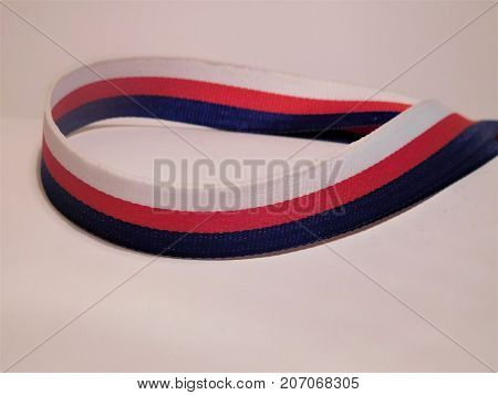 Three colours, blue, red, white on fibre
