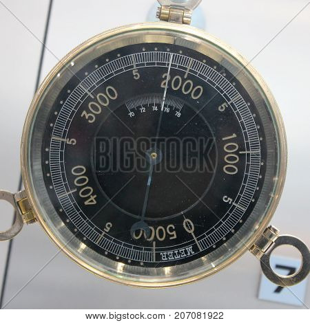 Old Vintage German Altimeter barometer with based on a white background isolated 0-5000 meter.