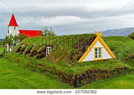 Farm Museum in Glaumbaer - Iceland. Picturesque village of old houses covered with turf and grass.