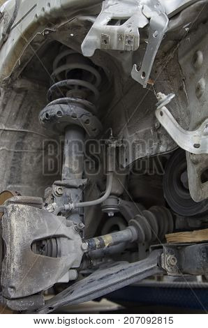 View of the shock absorbers of a crashed car