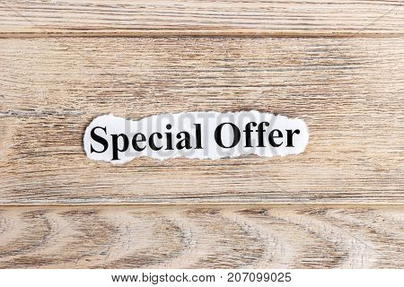 Special offer text on paper. Word Special offer on torn paper. Concept Image.