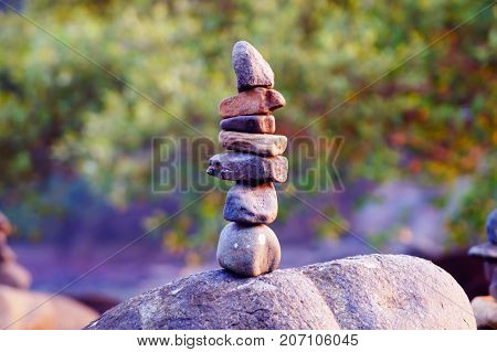 Japanese rock garden on Palolem beach in Goa, India. Zen (dzen) stones. Indian nature. Meditation and relax place on the beach.