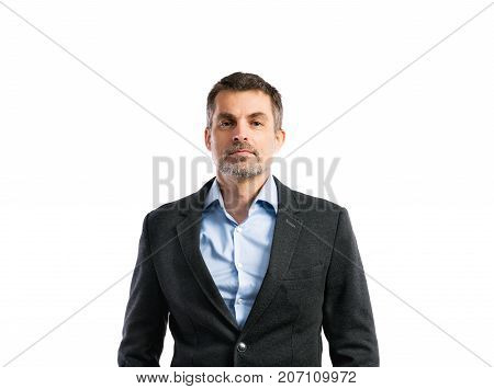 Mature handsome hipster man in blue shirt and dark jacket. Studio shot on white background, isolated.