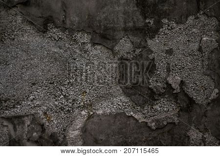 Black wall background. Grunge texture with stone and old iron parts
