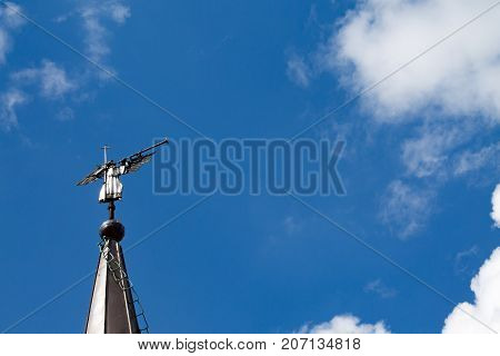 Weathervane in the form of an angel on the roof