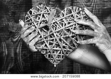 Female Hand Holding Heart