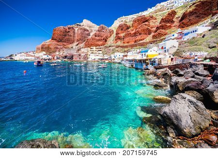 The old harbor of Ammoudi under the famous village of Ia at Santorini, Greece.