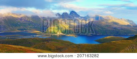 Panoramic view of Lofoten islands in Norway. Sunny nature of Norway. Summer landscape of Norwegian mountains.