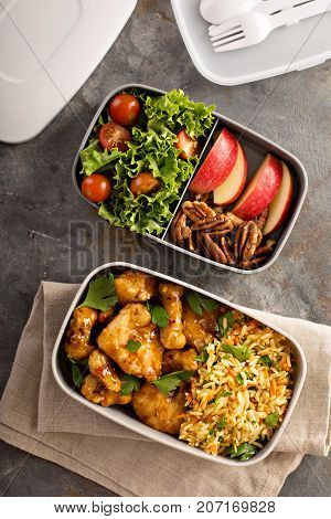 Lunch boxes with food ready to go for work or school, ahead meal preparation or dieting concept