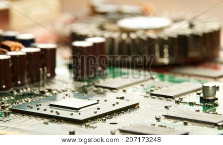 Microprocessor with motherboard background. Computer board chip circuit. Microelectronics hardware concept. electronic device.