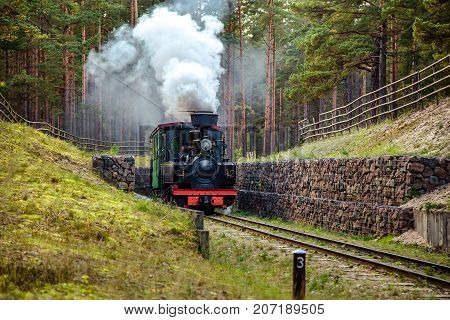 retro-train on a narrow-gauge railway in the museum Ventspilsn a narrow-gauge railway
