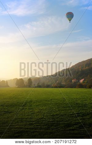 Balloon over field. Rural scenic. Czech Republic.