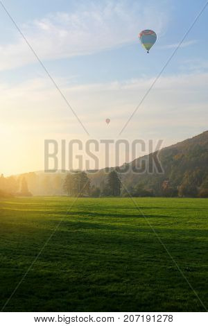 Balloon over field. Rural scenic. Czech Republic.