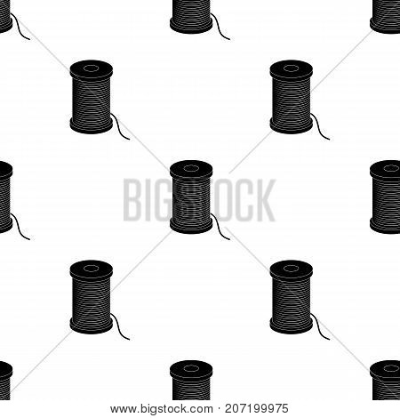 A reel of blue thread.Sewing or tailoring tools kit single icon in black style vector symbol stock web illustration.