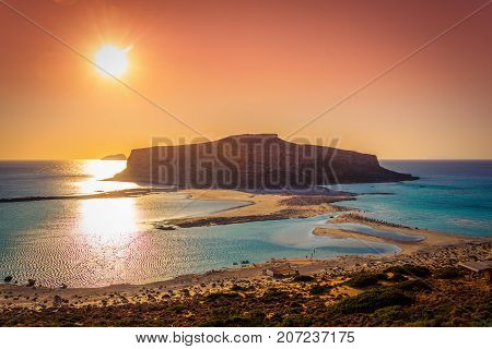 Amazing view of Balos Lagoon with magical turquoise waters, lagoons, tropical beaches of pure white sand and Gramvousa island on Crete, Greece