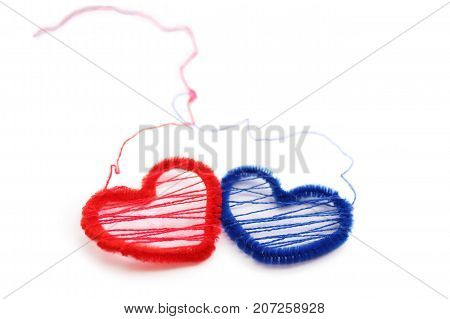 Romantic red and blue hearts isolated on white background
