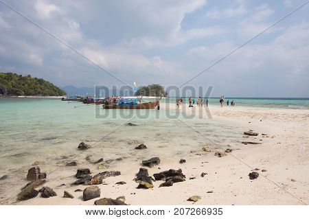 Traditional thai longtail boat with tourist at Krabi sea Thailand