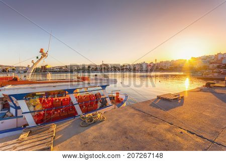 The pictursque port of Sitia, Crete, Greece at sunset. Sitia is a traditional town at the east Crete near the beach of palm trees, Vai.