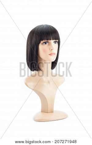 woman mannequin head fake with black hair wig on white background