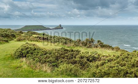 A landscape view of the Worms Head Rhossili South Wales.