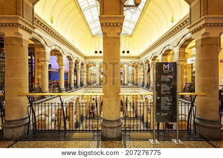 AMSTERDAM NETHERLANDS - JUNE 21 2016: Interior of the Magna Plaza with its beautiful architecture. Amsterdam Netherlands.