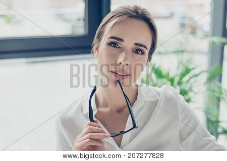 Close Up Portrait Of Successful Lady, Well Dressed, With Stylish Hair Do, Looking In Camera. Women B