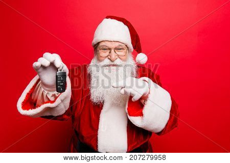 Success happiness dream december buyer ownership property purchase rent sell truck cars concept. Funny aged grandfather in red traditional outfit and headwear. X mas noel surprise time!