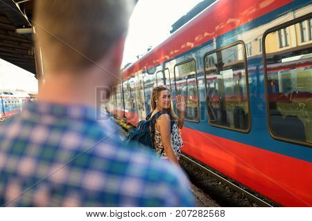 Female says farewall to boyfriend and goes away