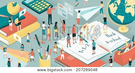 Children playing and learning with their teachers school supplies and books: back to school and education concept