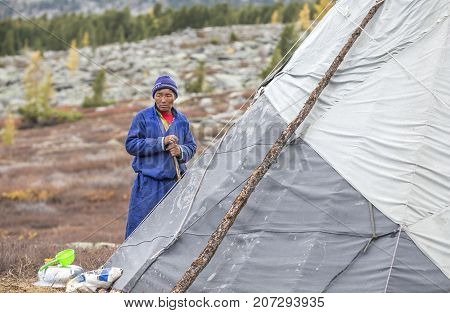 nomad man outside his yurt in northern Mongolia