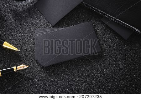 Blank black business card mock up black background for use us contact information design templete.