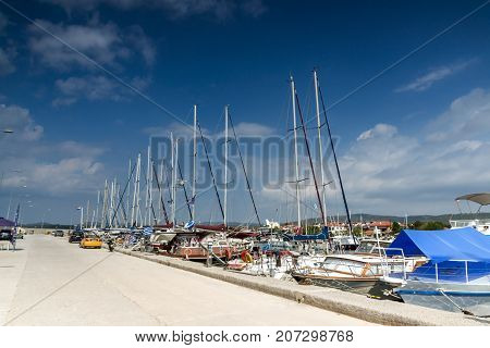 CHALKIDIKI, CENTRAL MACEDONIA, GREECE - AUGUST 25, 2014:  Panoramic view of port of Nikiti at Sithonia peninsula, Chalkidiki, Central Macedonia, Greece