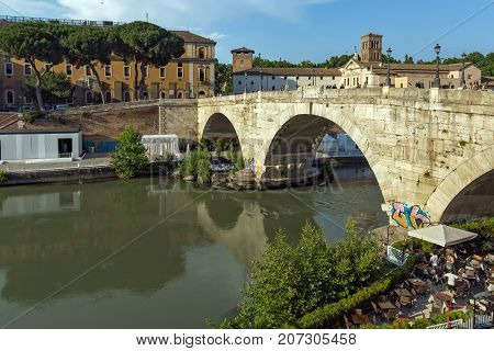 ROME, ITALY - JUNE 22, 2017: Amazing view of Tiber River and Pons Cestius in city of Rome, Italy