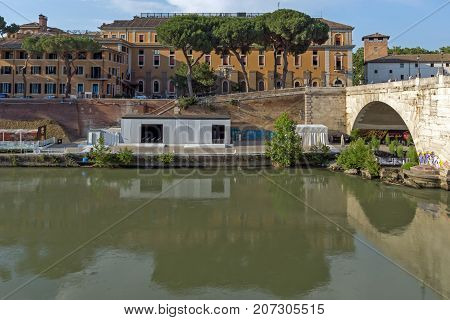 ROME, ITALY - JUNE 22, 2017: Amazing view of Tiber River and Pons Cestius in city of Rome, Italy