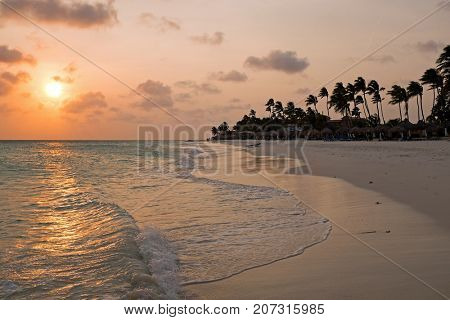 Sunset on Druif beach on Aruba island in the Caribbean Sea