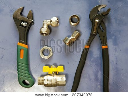 adjust wrench power grip groove joint pillers and elements of water and gas shutoff valves flat lay