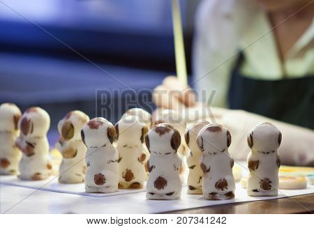 TALLINN ESTONIA- JUNE 17-2012:the woman paints figures in shop at the museum of marzipans