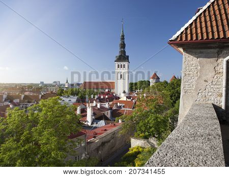 aerial view on observation deck of Old city's roofs and St. Nicholas' Church (Niguliste) . Tallinn. Estonia