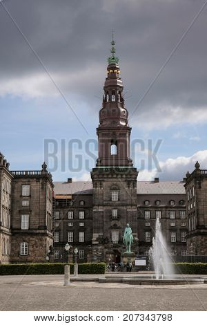Christiansborg Castle With Fountain In The Center Of Copenhagen Denmark