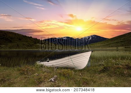 Boat In Front Of A River In Jotunheimen Norway