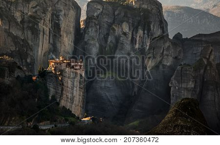Breathtaking view of Meteora at sunset, Greece. Geological formations of big rocks with Monasteries on top of them.