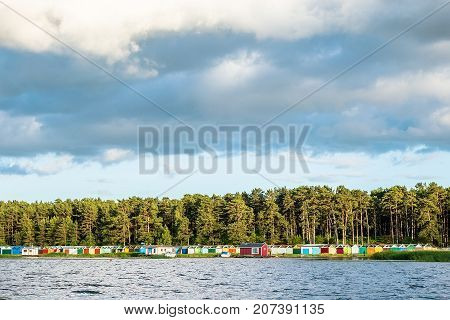 Boat houses on Lielupe river estuary to Baltic sea, Jurmala, Latvia