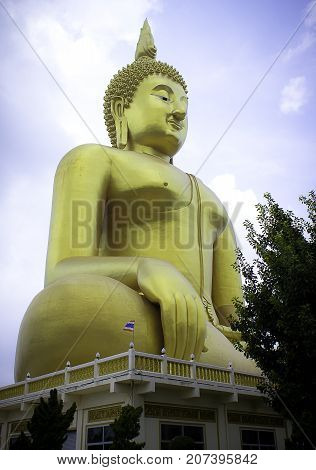 The big golden Buddha statue in Muang temple Ang Thong Thailand.